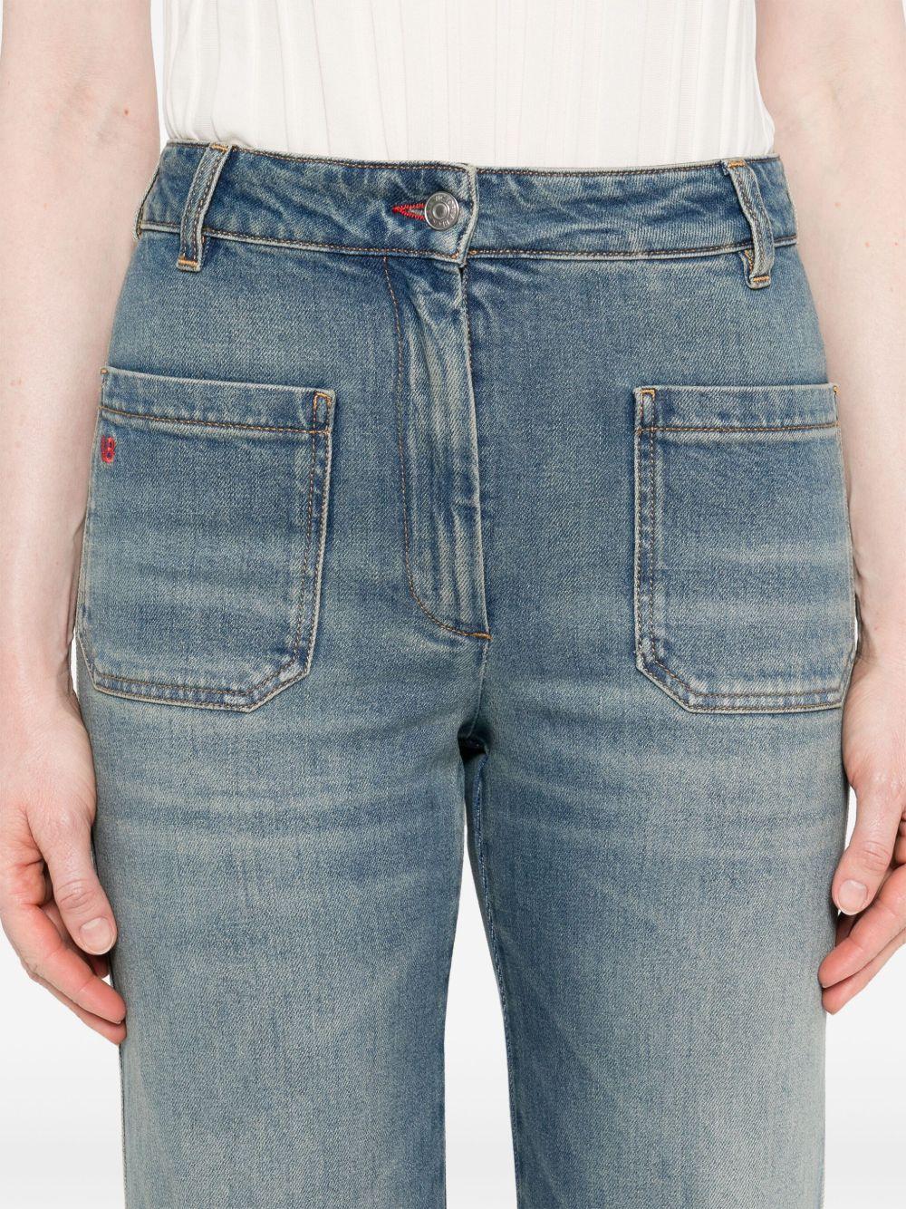 VICTORIA BECKHAM Jeans elasticizzati con applicazione logo 