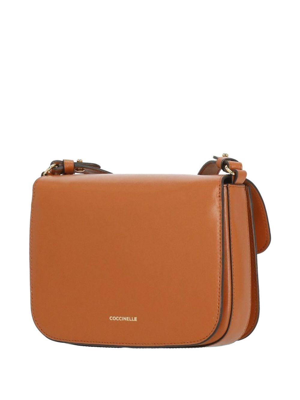 COCCINELLE Borsa a tracolla in pelle marrone con placca logo 