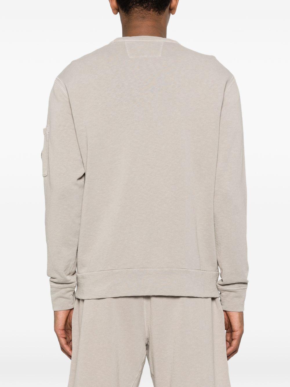 CP COMPANY Felpa girocollo con patch logo sulla manica 
