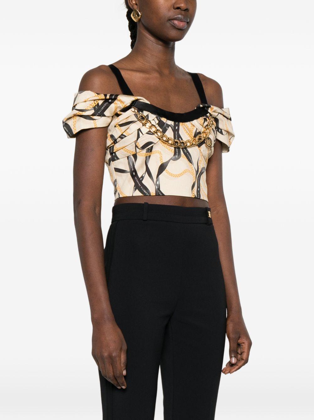 ELISABETTA FRANCHI Top con stampa grafica beige e nero con detagglio a catena 
