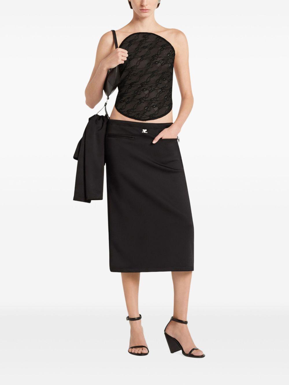 COURREGES Gonna nera con mini tasche frontali 
