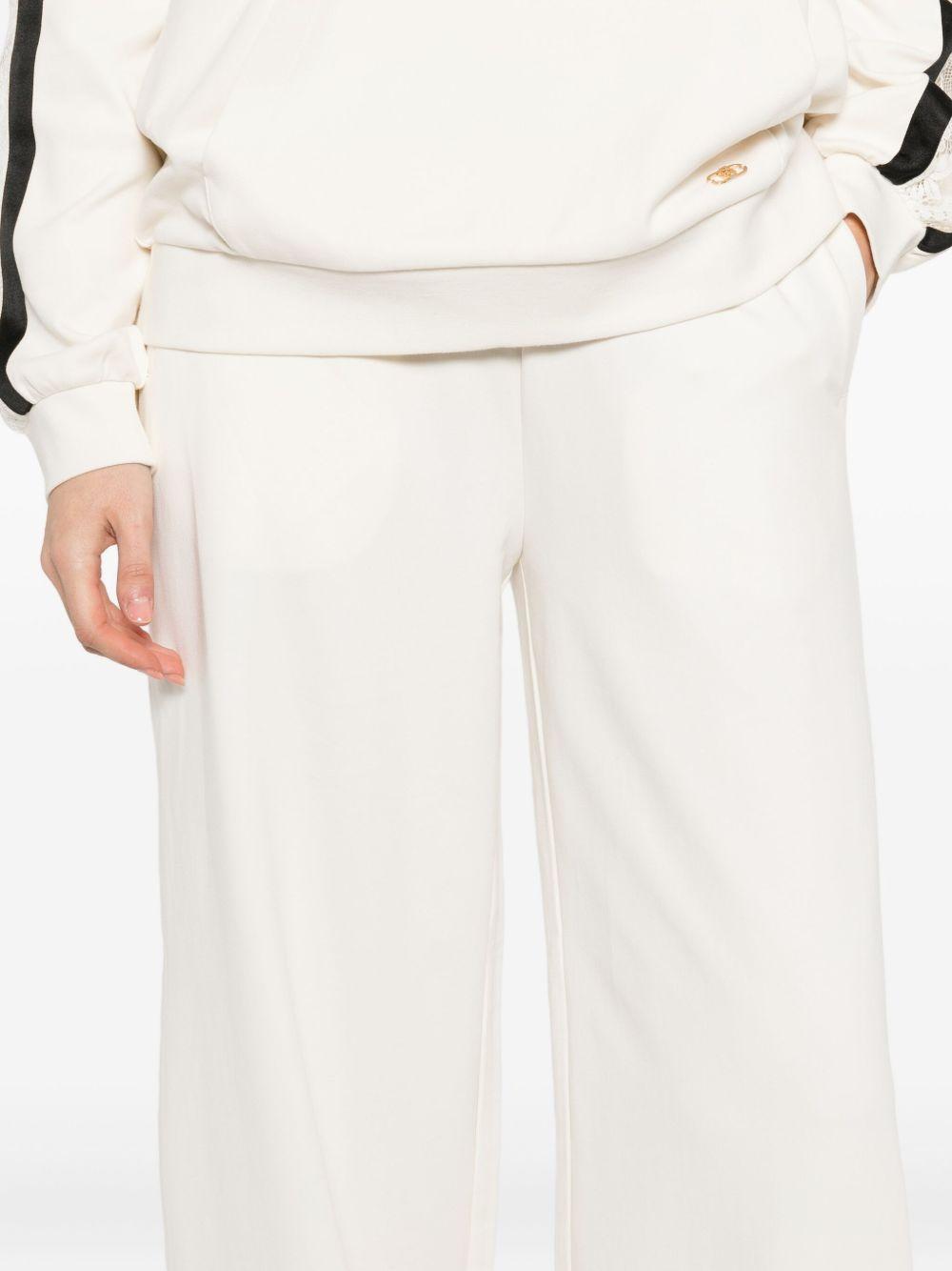 LIUJO Pantaloni sportivi bianco con logo 