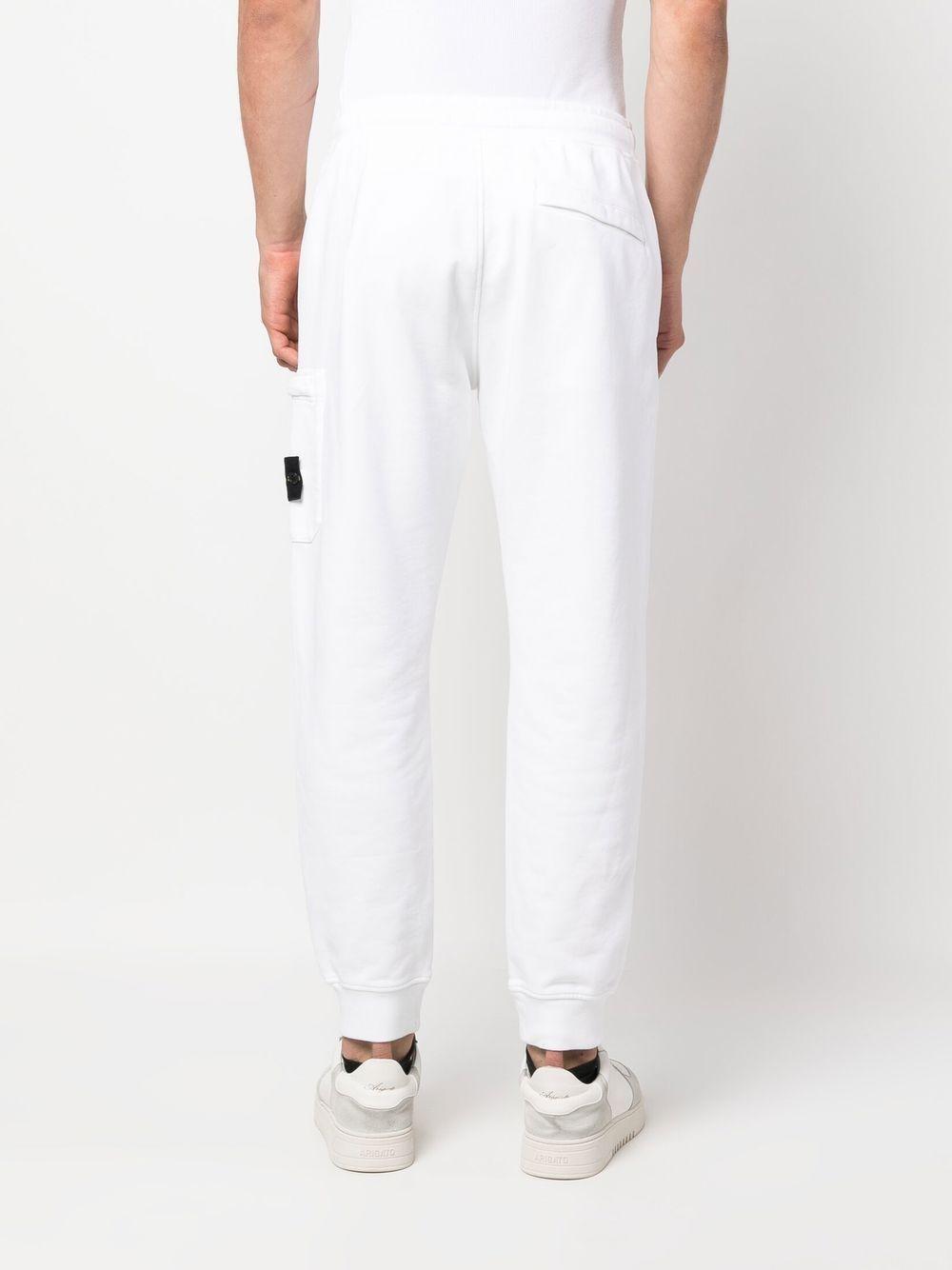 STONE ISLAND Pantaloni di tuta in cotone bianco con logo 