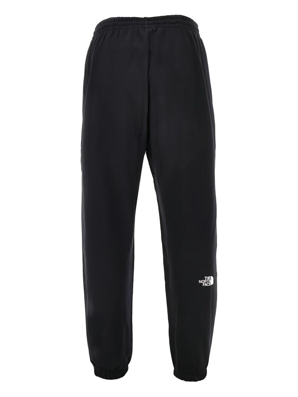 THE NORTH FACE Pantaloni sportivi in cotone nero con logo bianco 