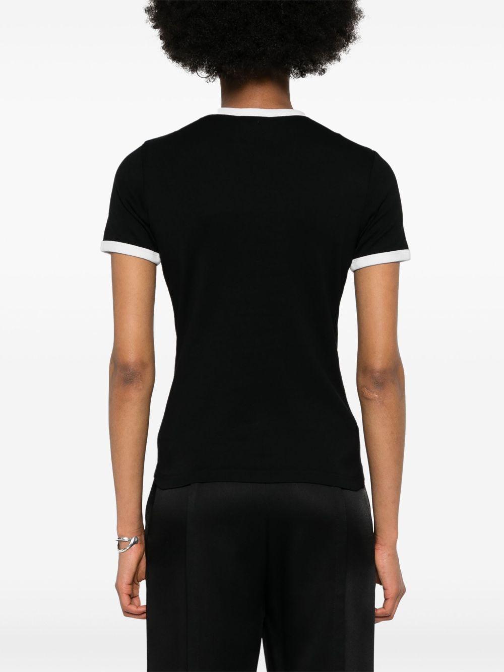 COURREGES T-shirt slim nera con rifiniture bianche 