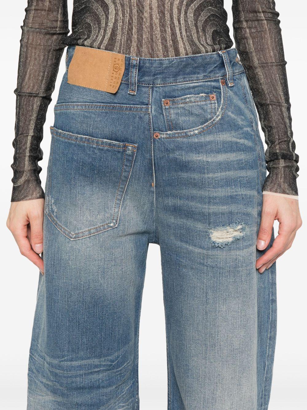 MM6 MAISON MARGIELA Jeans lunghi a gamba larga effetto wash 