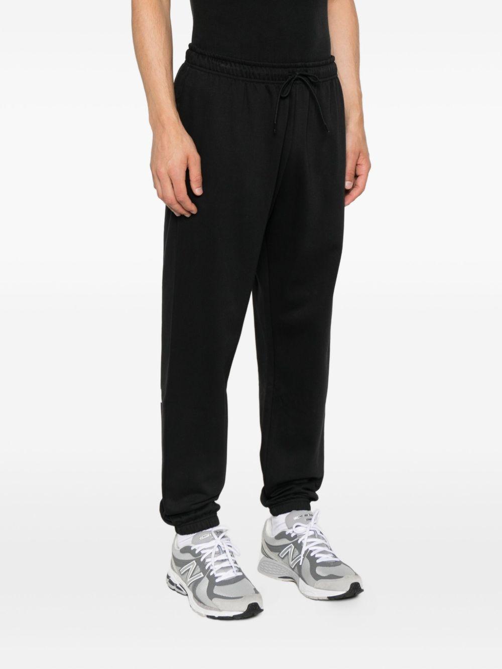 THE NORTH FACE Pantaloni jogger neri con logo 