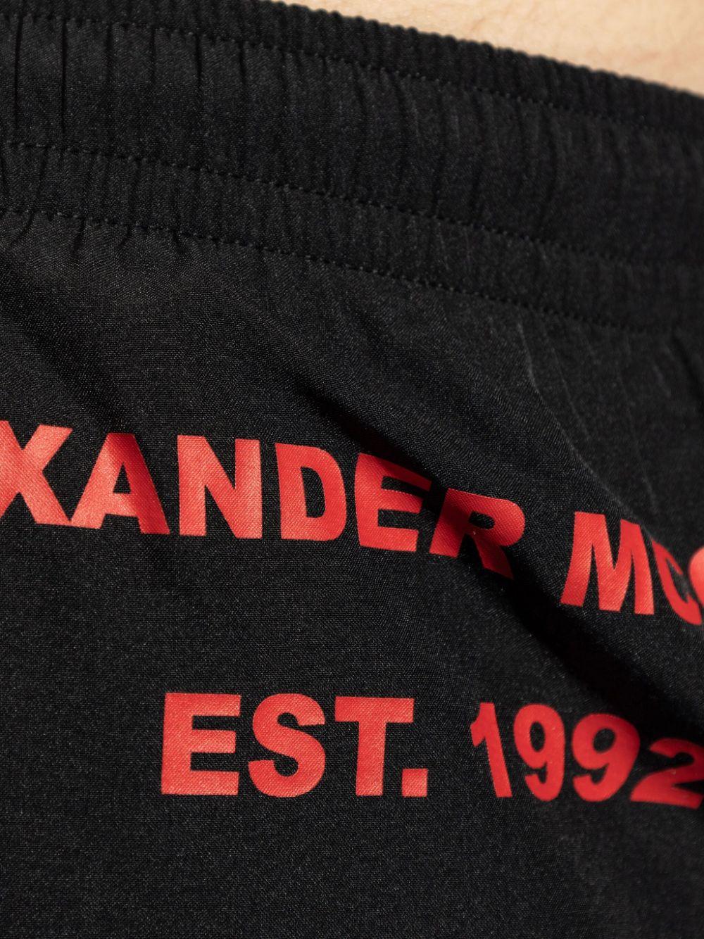 ALEXANDER McQUEEN Costume con logo stampato laterale a contrasto 