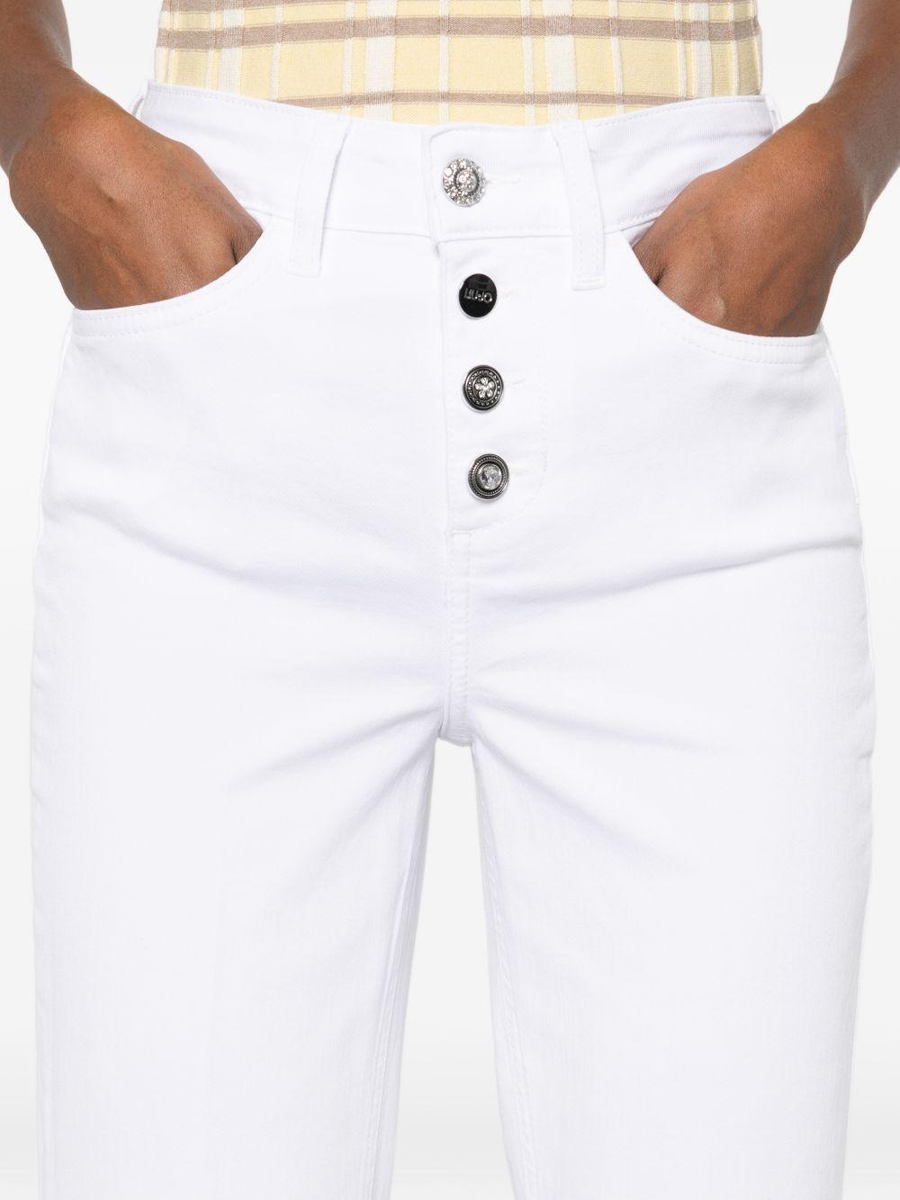 LIUJO Pantaloni bianchi in denim con tasche 