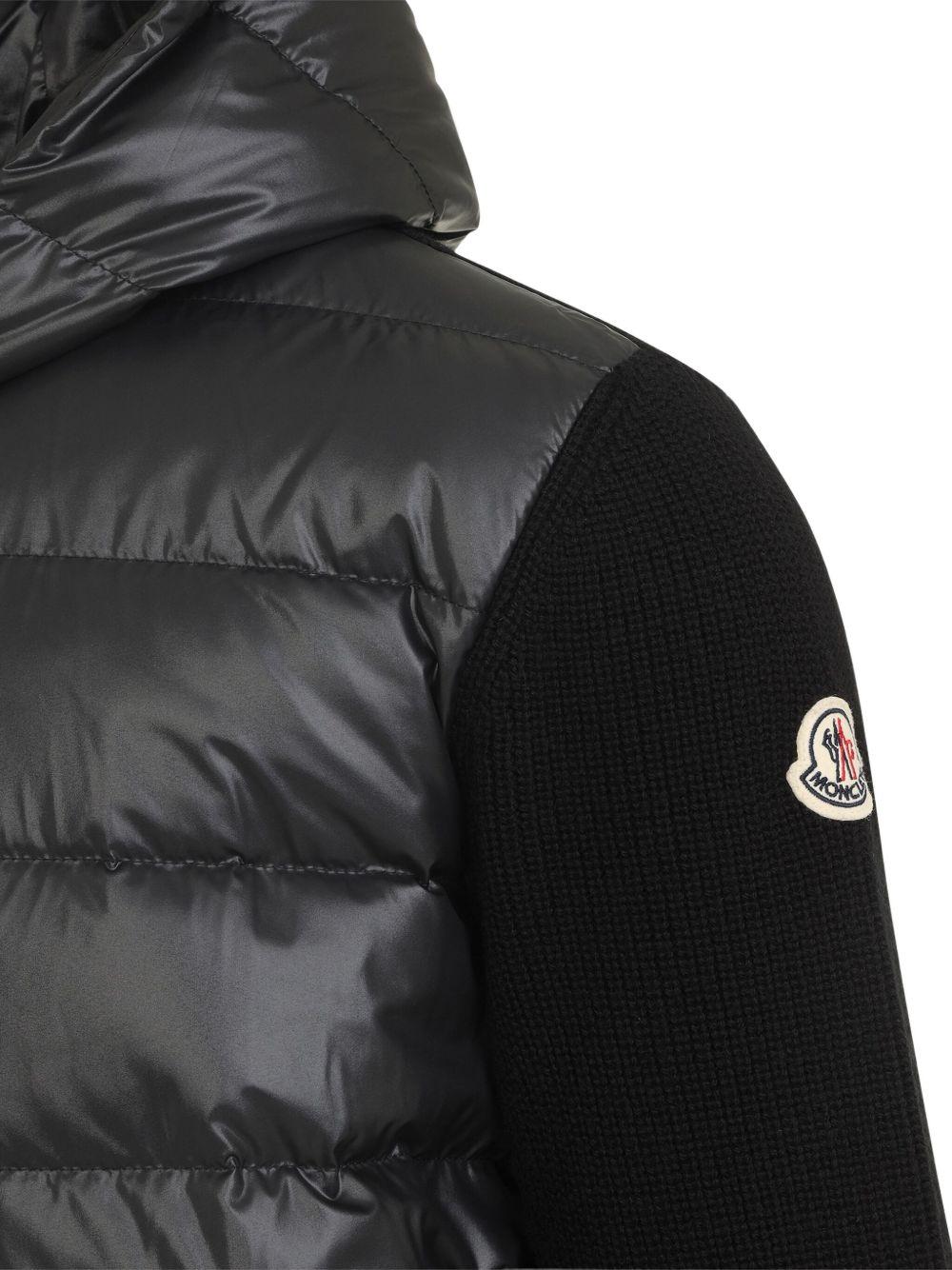 MONCLER Giacca bomber nera imbottita con cappuccio e tasche laterali 