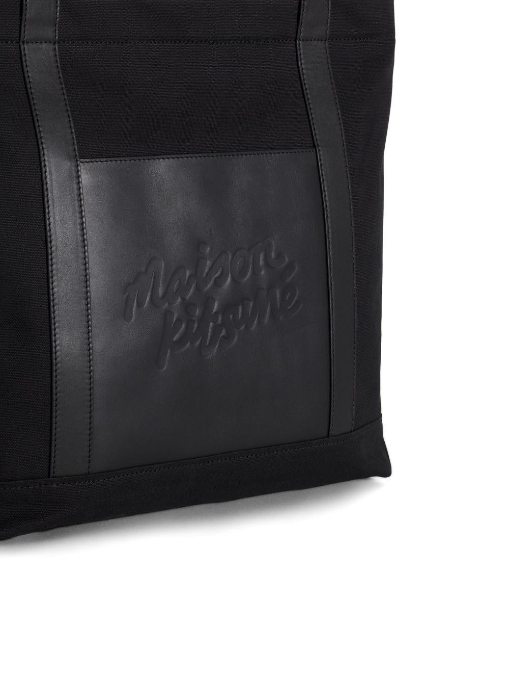 MAISON KITSUNE Borsa a mano con tasca esterna e logo ricamato nero 