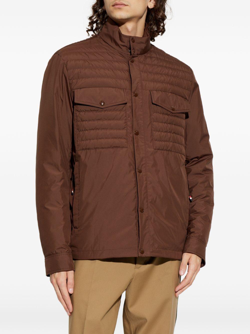 MONCLER Piumino corto Vnorviane marrone trapuntato con tasche 