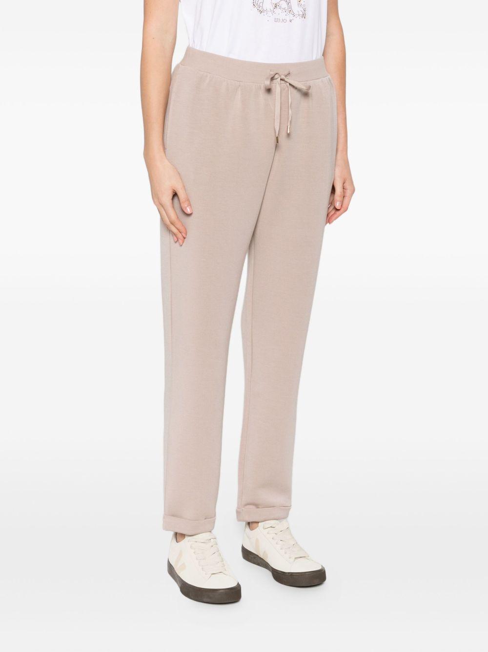 LIUJO Pantaloni sportivi beige con logo 
