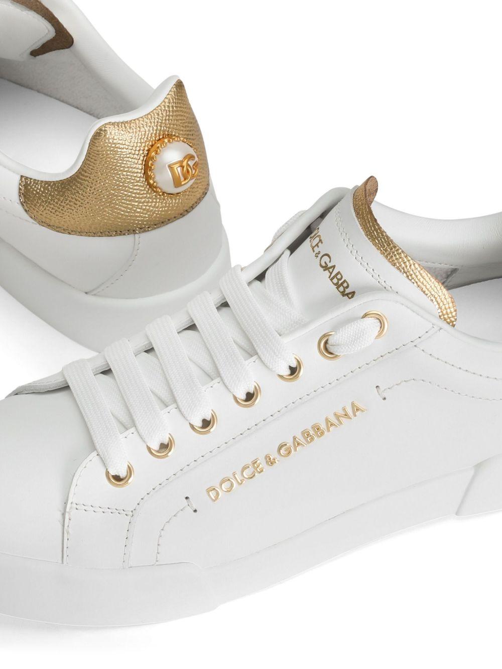 DOLCE e GABBANA Sneakers Portofino in pelle bianca e oro 