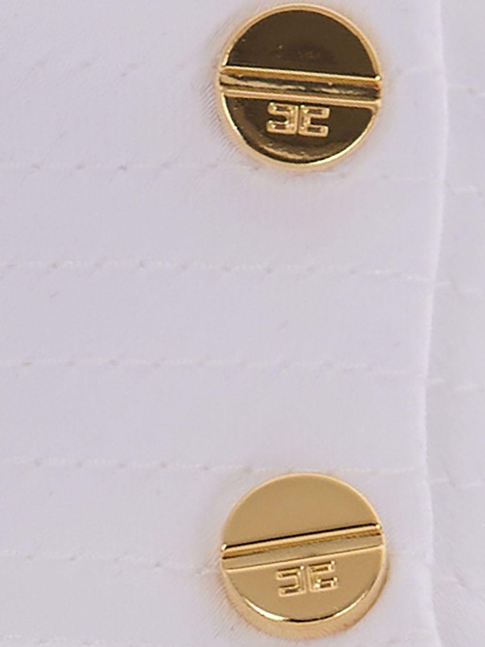 ELISABETTA FRANCHI Top smanicato in avorio con scollo morbido e dettaglio cut-out 