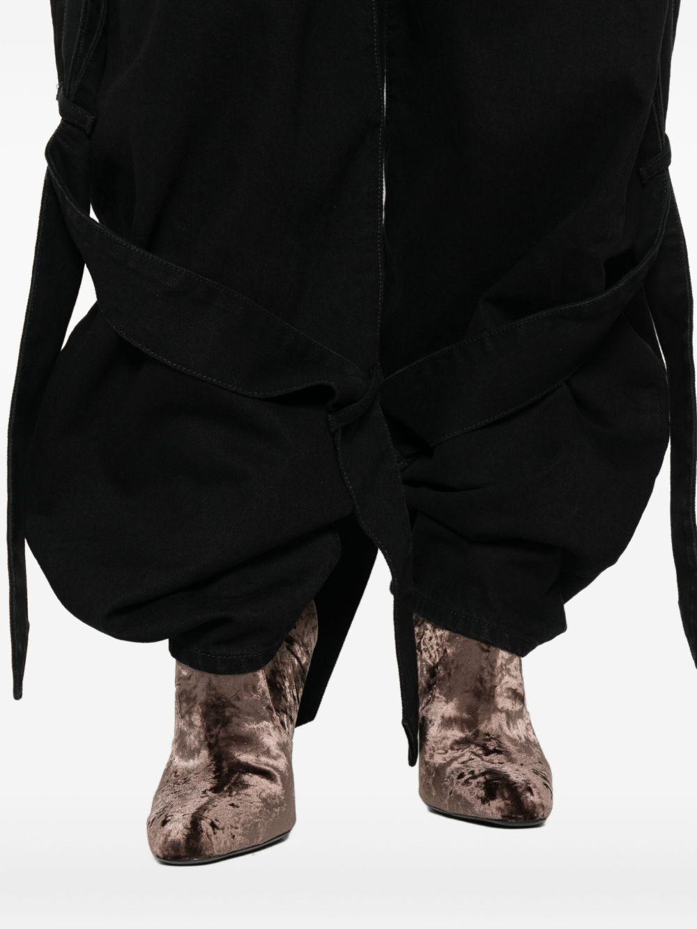 THE ATTICO Jeans neri con pannelli a contrasto e dettagli con laccetti annodati 