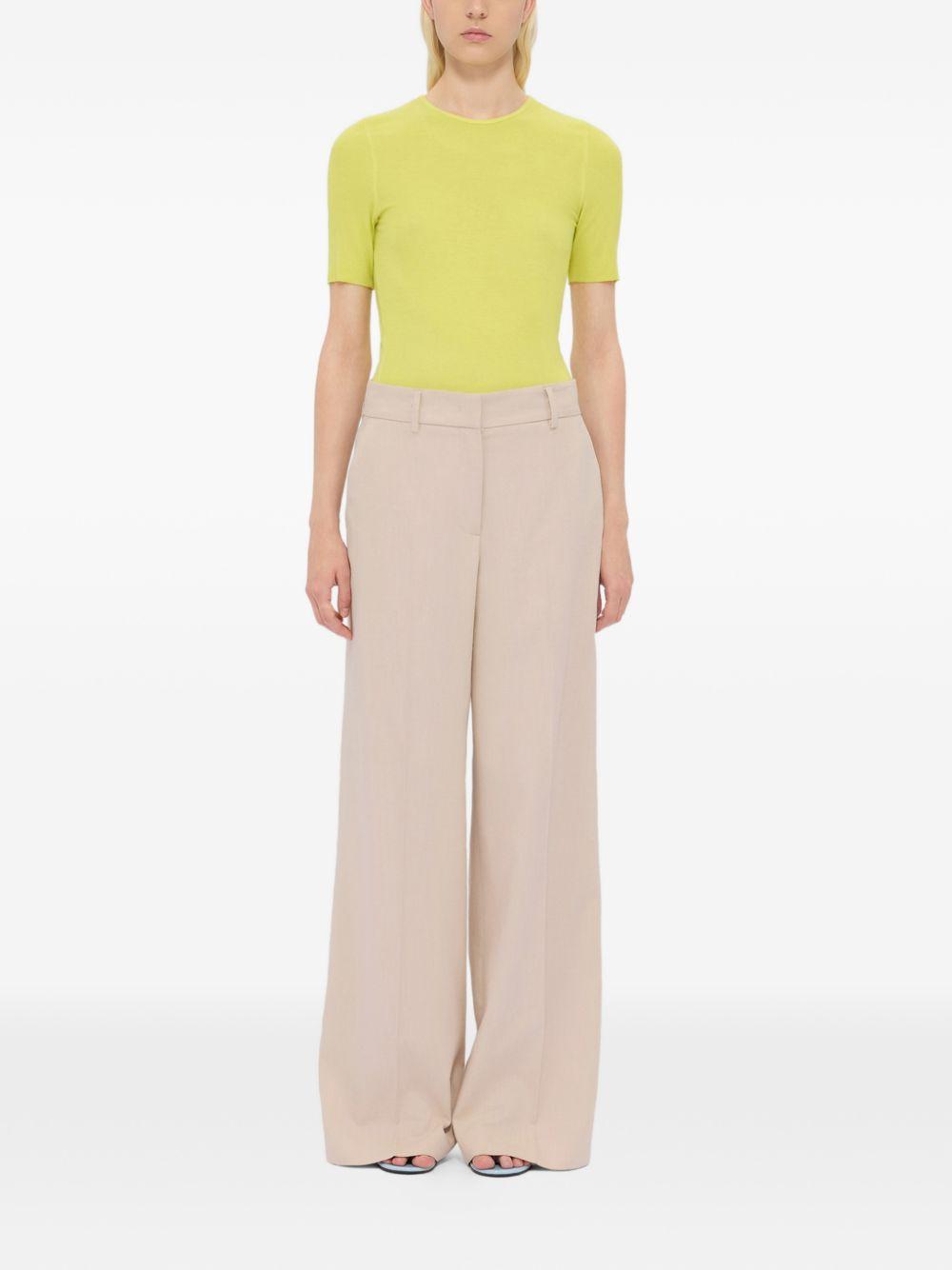 MSGM Pantaloni a gamba larga in cotone beige 