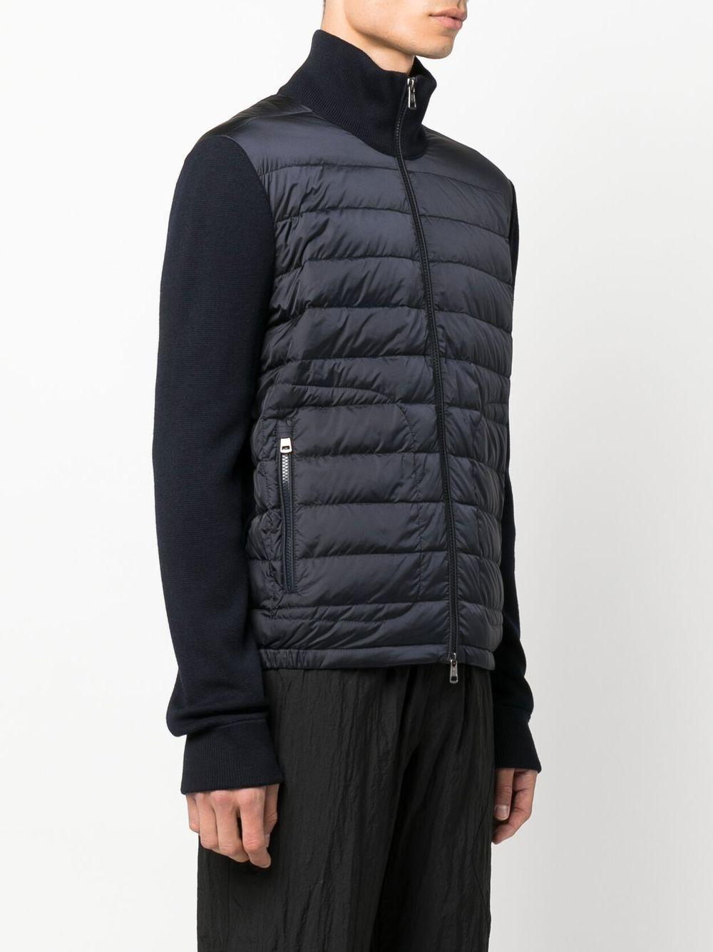 MONCLER Piumino blu navy con maniche di lana 