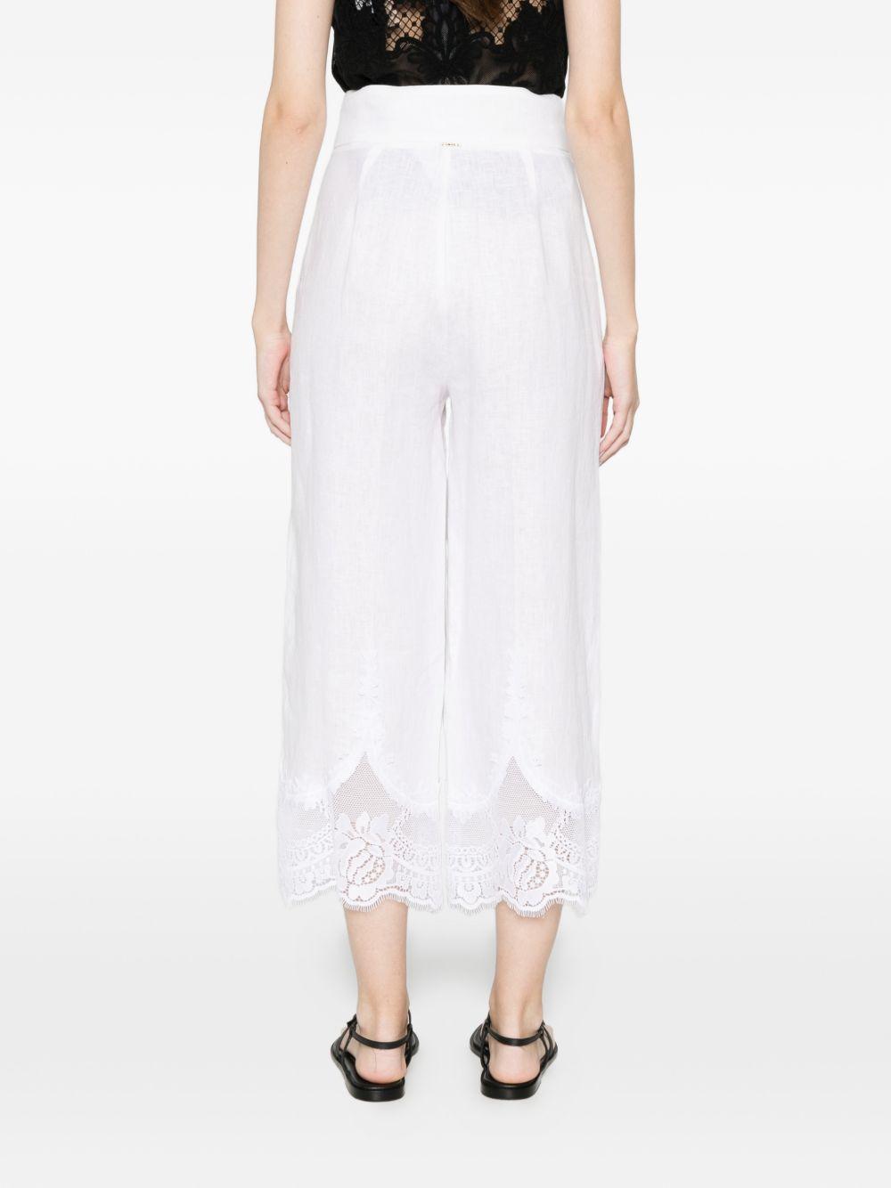 TWINSET Pantaloni bianchi di lino con pizzo sul fondo 