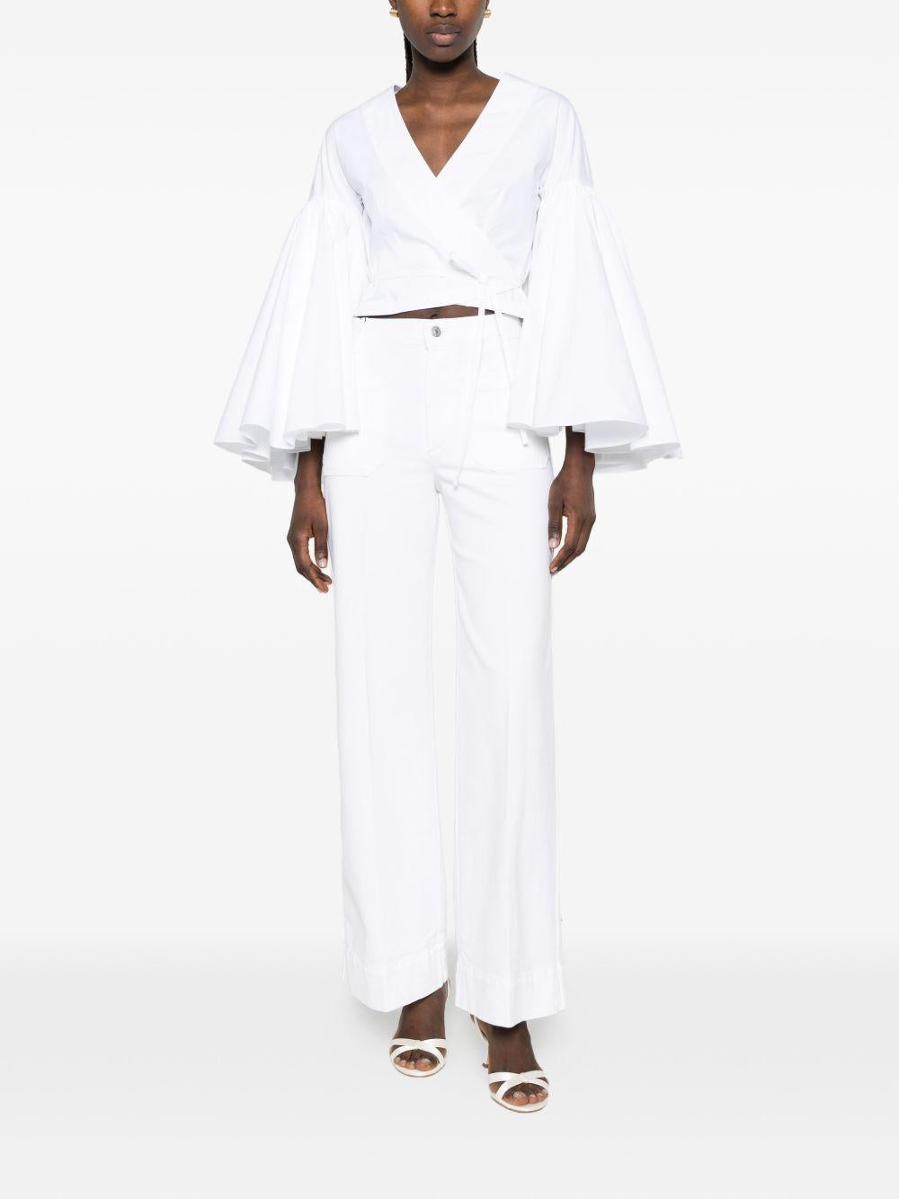 VICTORIA BECKHAM Jeans lunghi bianchi in cotone elasticizzato 