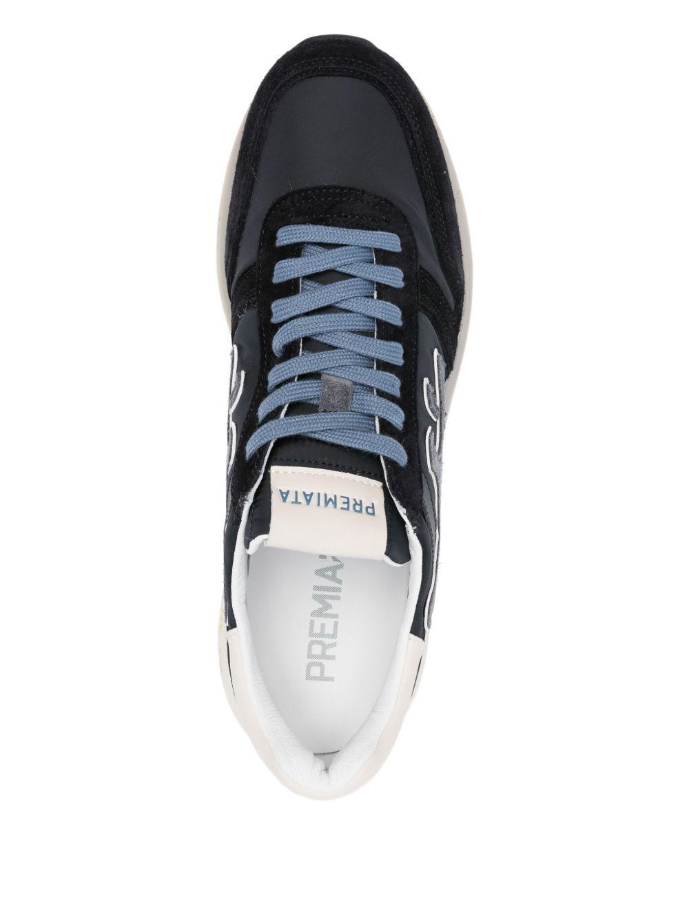PREMIATA Sneakers Mick in pelle blu con suola bianca 