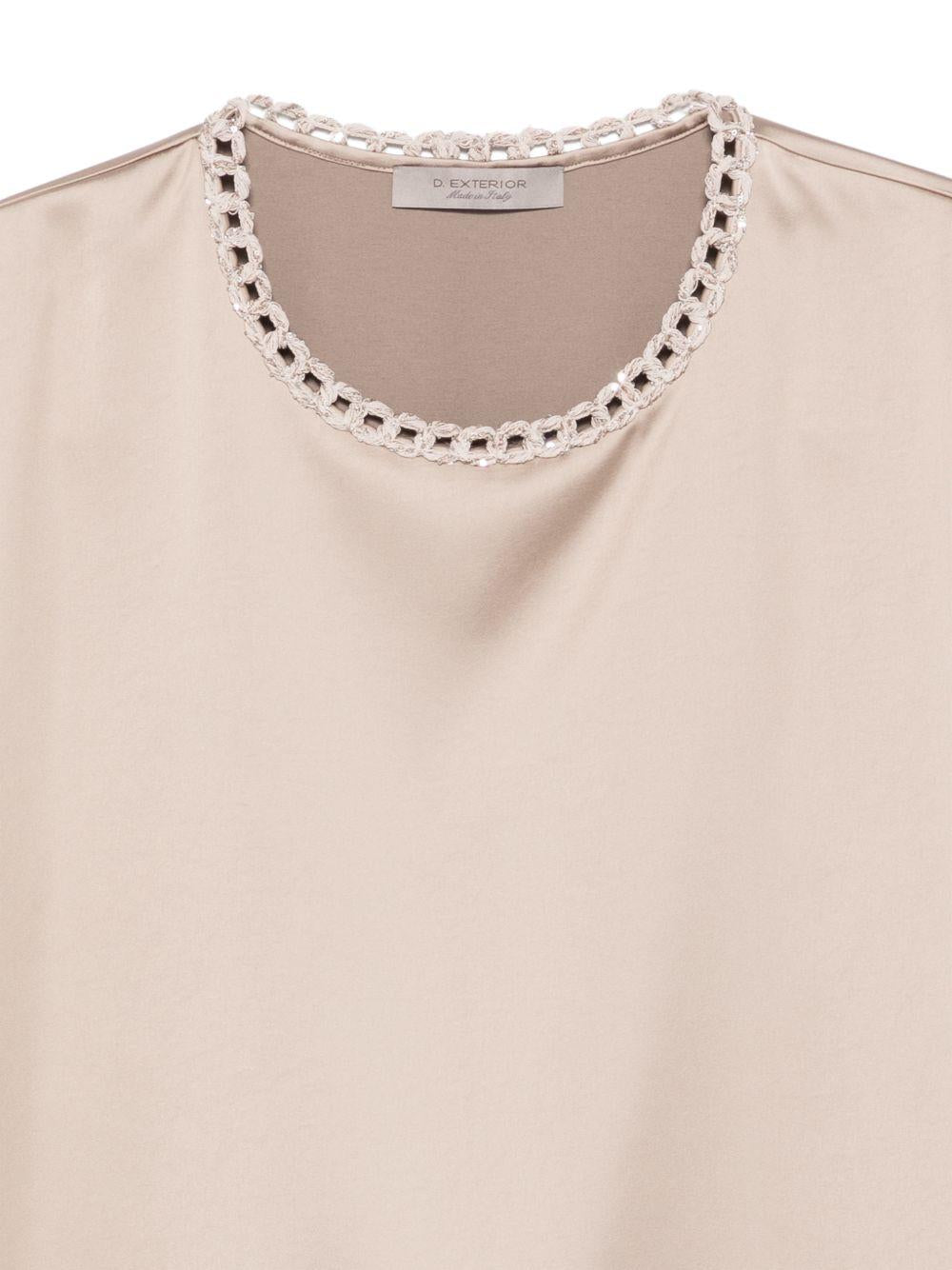 D EXTERIOR Top color beige satinato con strass 