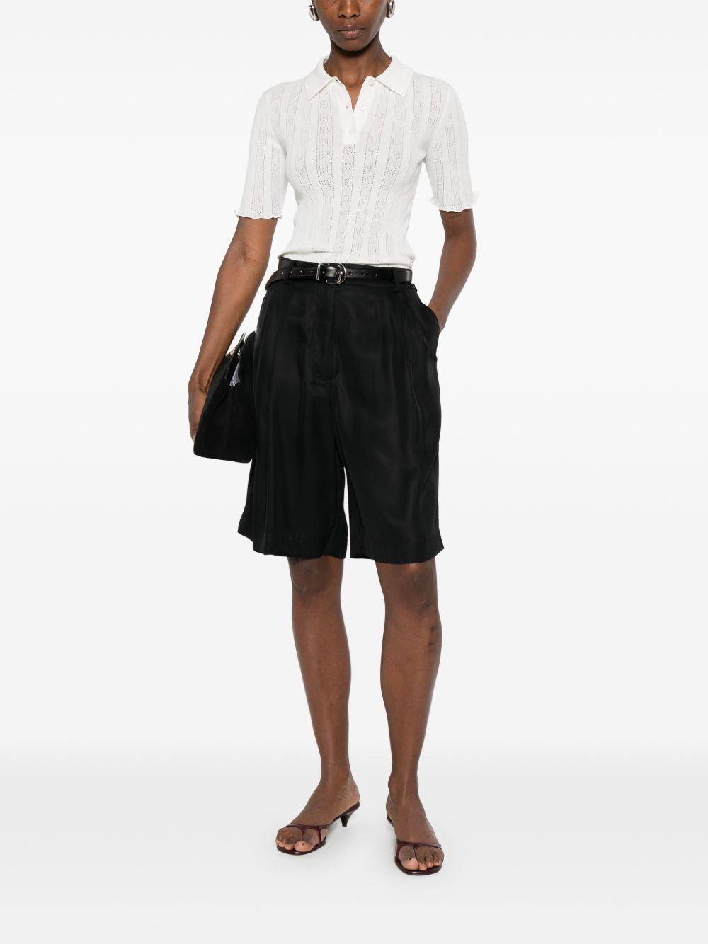VICTORIA BECKHAM Polo in cotone bianco traforata 