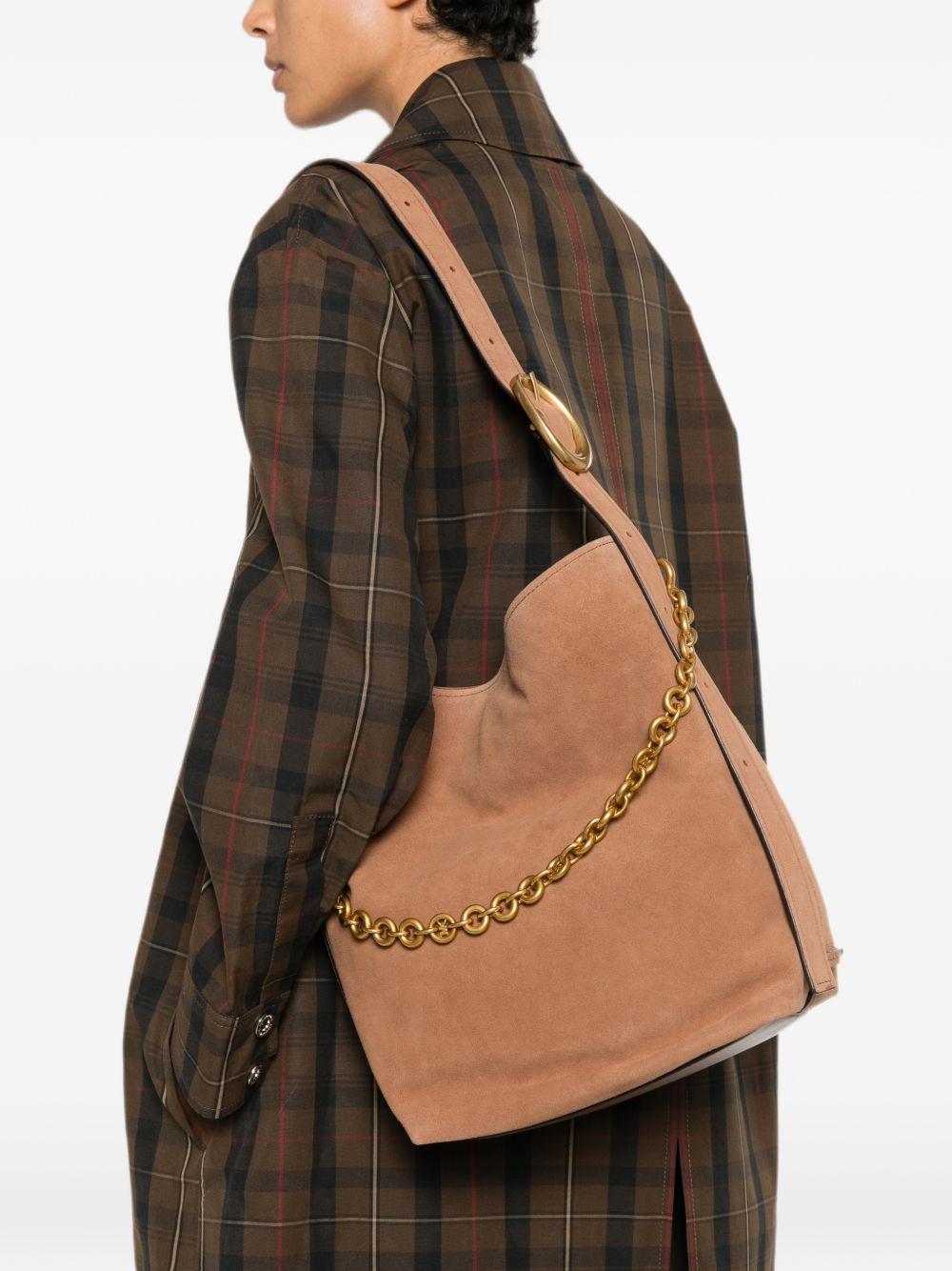 MICHAEL KORS Borsa bucket in pelle scamosciata marrone con catena dorata 