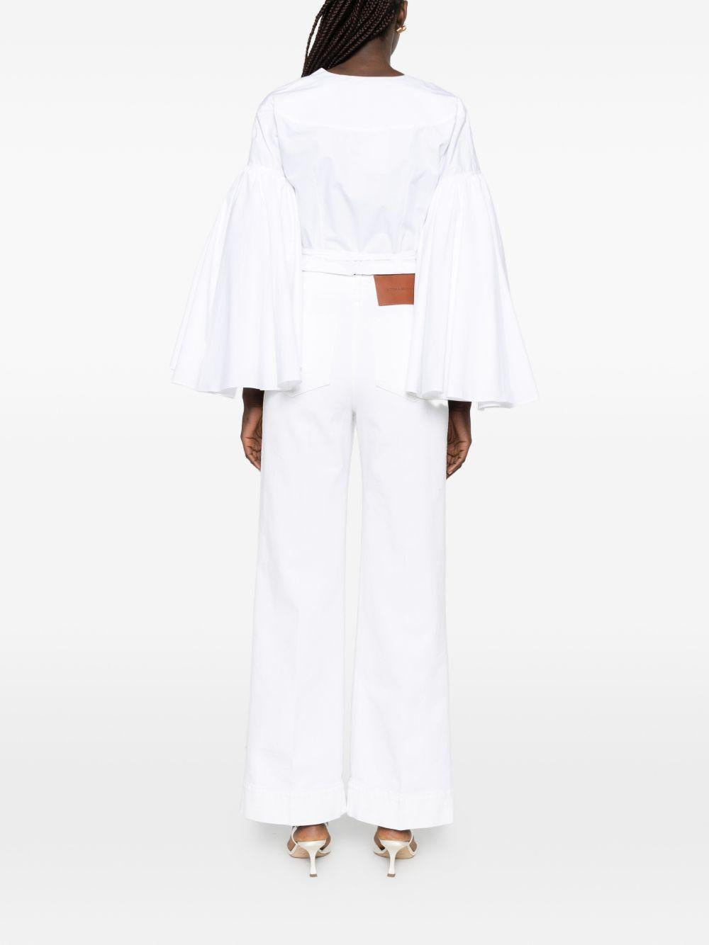 VICTORIA BECKHAM Jeans lunghi bianchi in cotone elasticizzato 