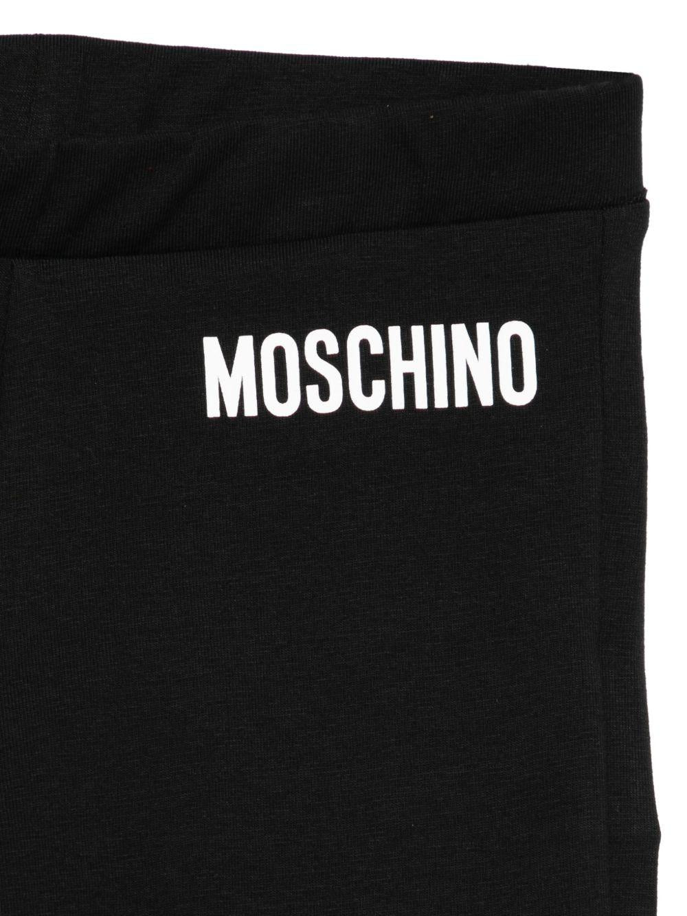 MOSCHINO Leggings neri con stampa 