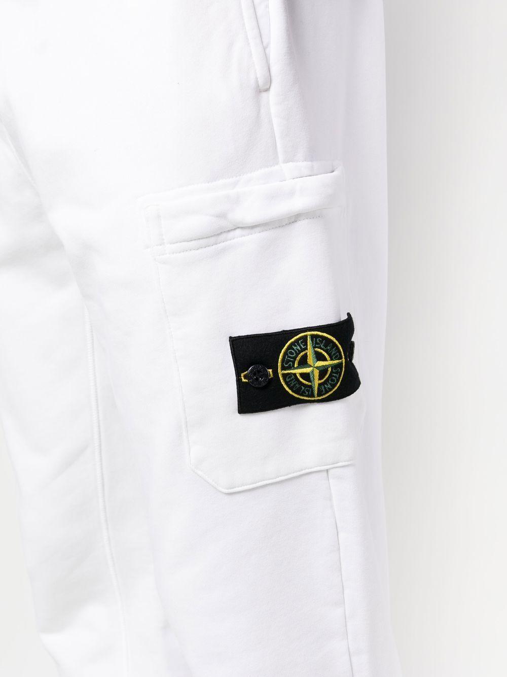 STONE ISLAND Pantaloni di tuta in cotone bianco con logo 