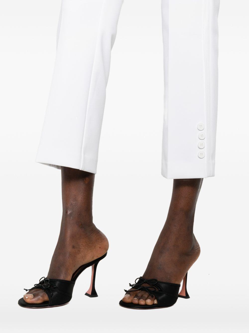 ELISABETTA FRANCHI Pantaloni linea slim fit in tessuto bianco 