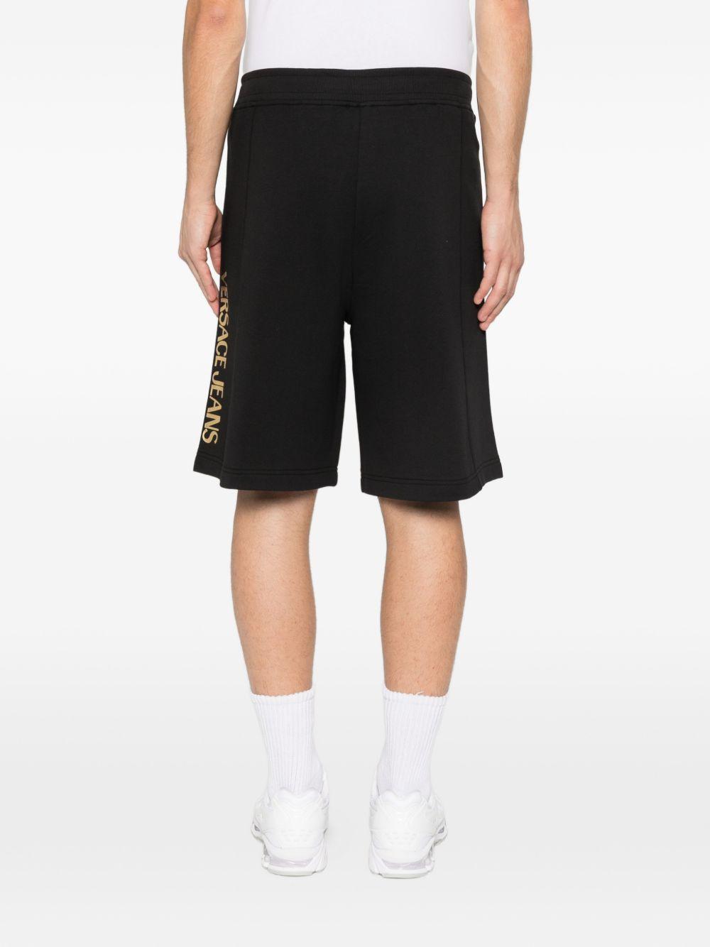 VERSACE JEANS COUTURE Short in cotone nero con logo oro 