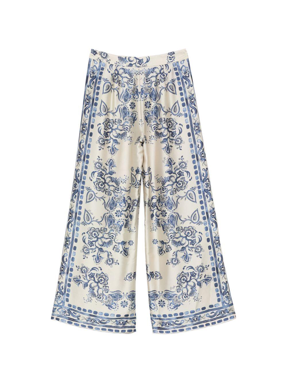 LIUJO Pantalone color crema con stampa floreale blu 