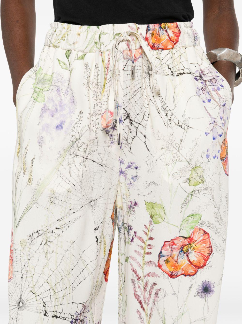 ALEXANDER McQUEEN Pantaloni in cotone con fantasia floreale 