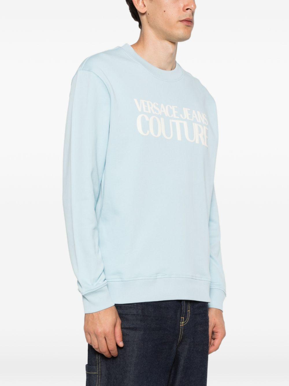 VERSACE JEANS COUTURE Felpa in cotone celeste girocollo con logo bianco 