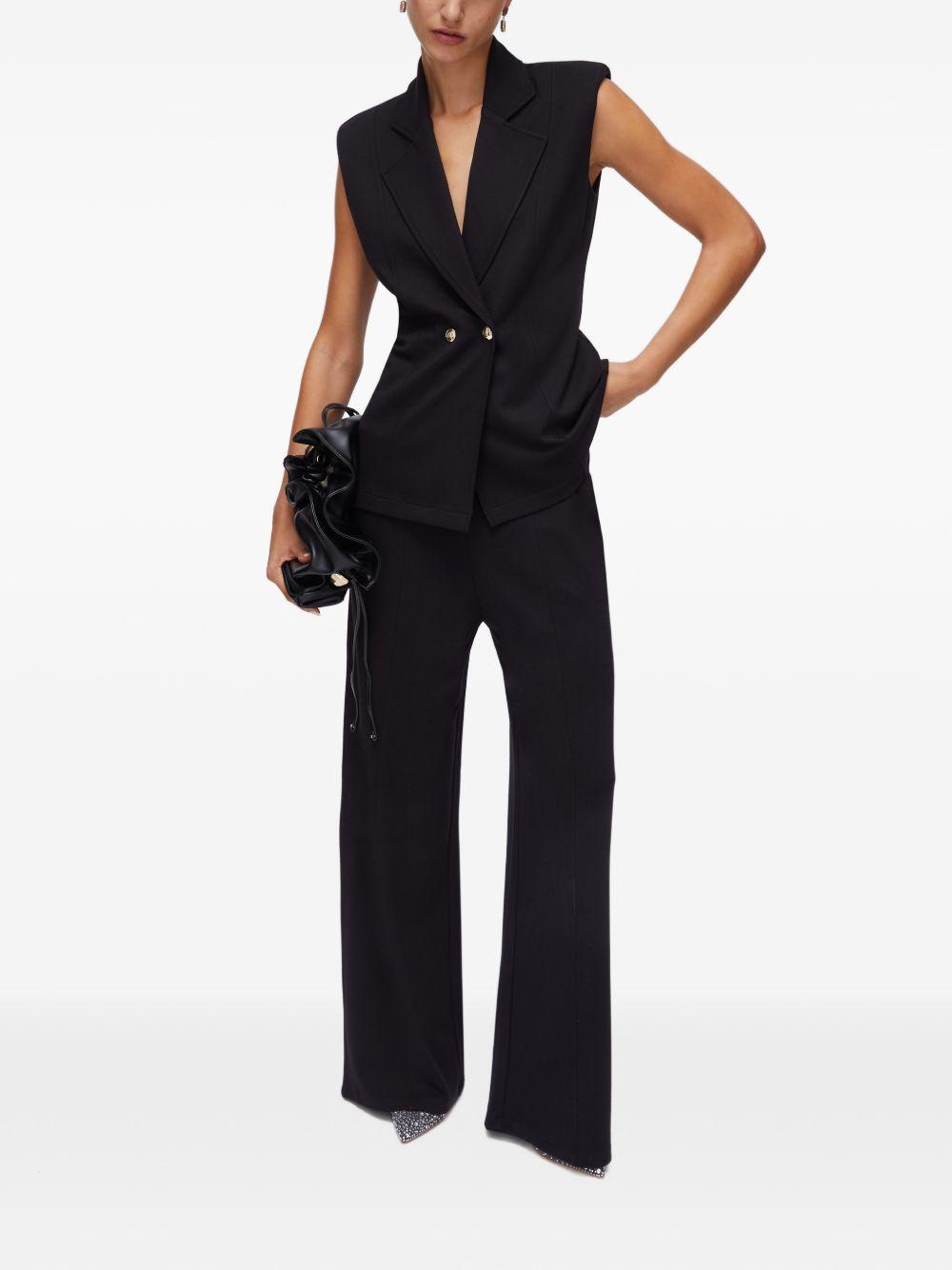 LIUJO Pantaloni neri in jersey con dettaglio catena 