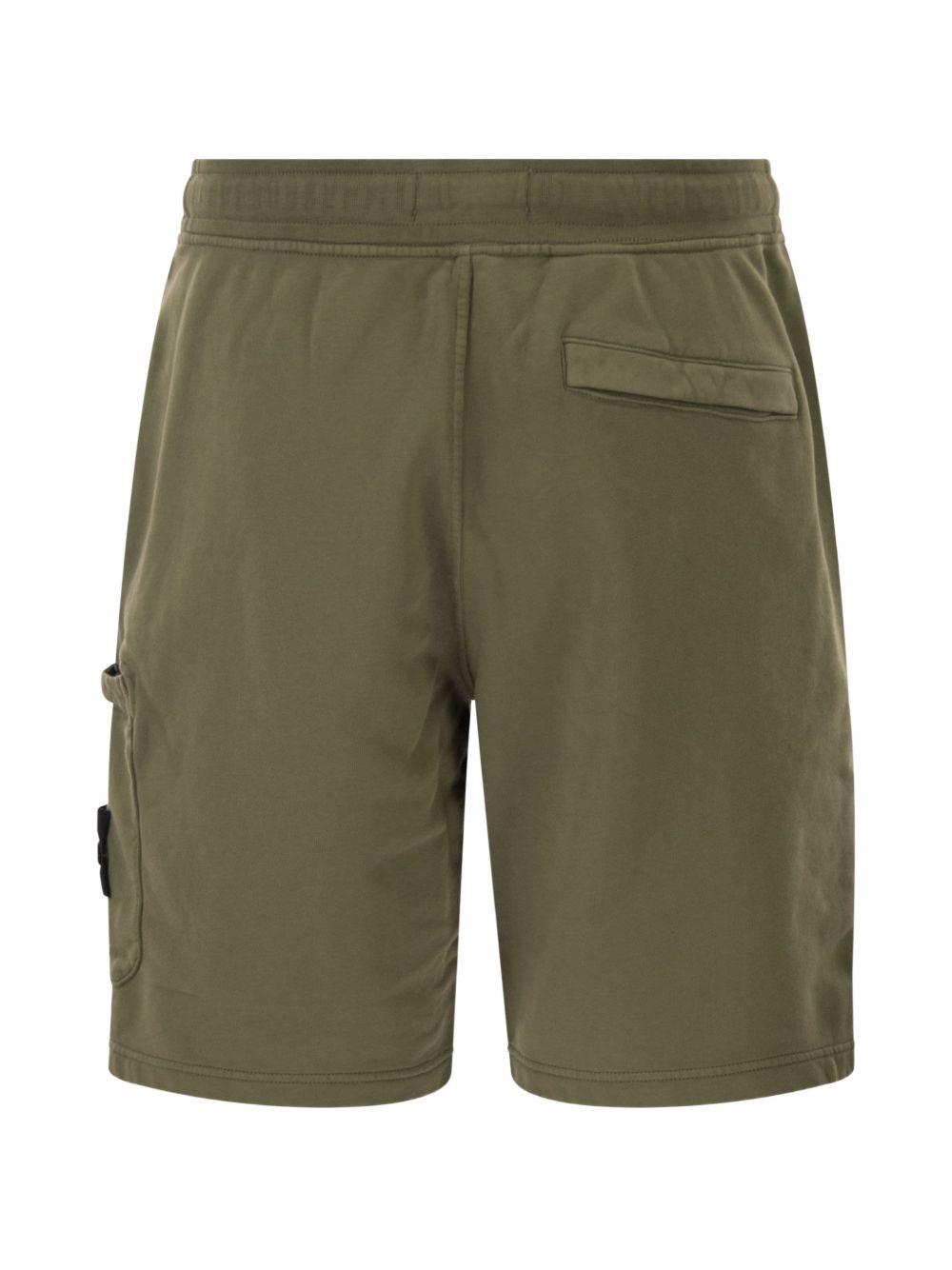 STONE ISLAND Shorts verde militare con tasche cargo 