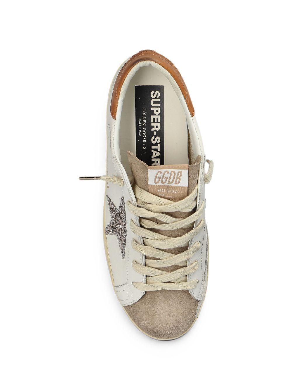GOLDEN GOOSE Sneakers Super-Star in pelle bianca con stella glitter 