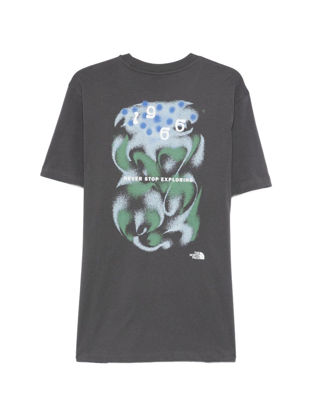 THE NORTH FACE T-shirt con logo sul petto e grafica sul retro 