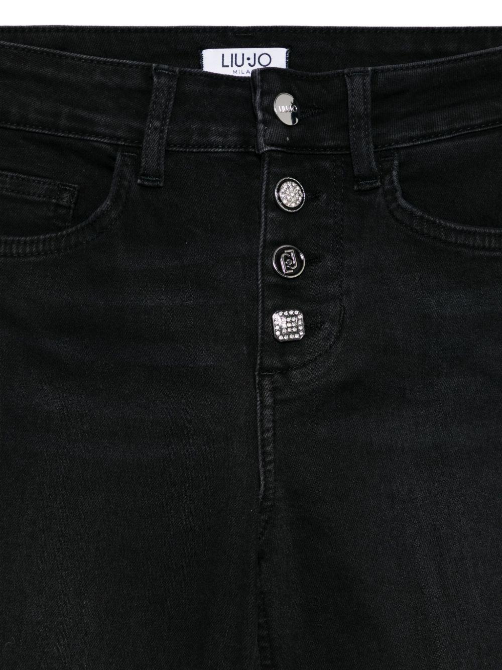 LIUJO Jeans neri a vita alta con gamba svasata 