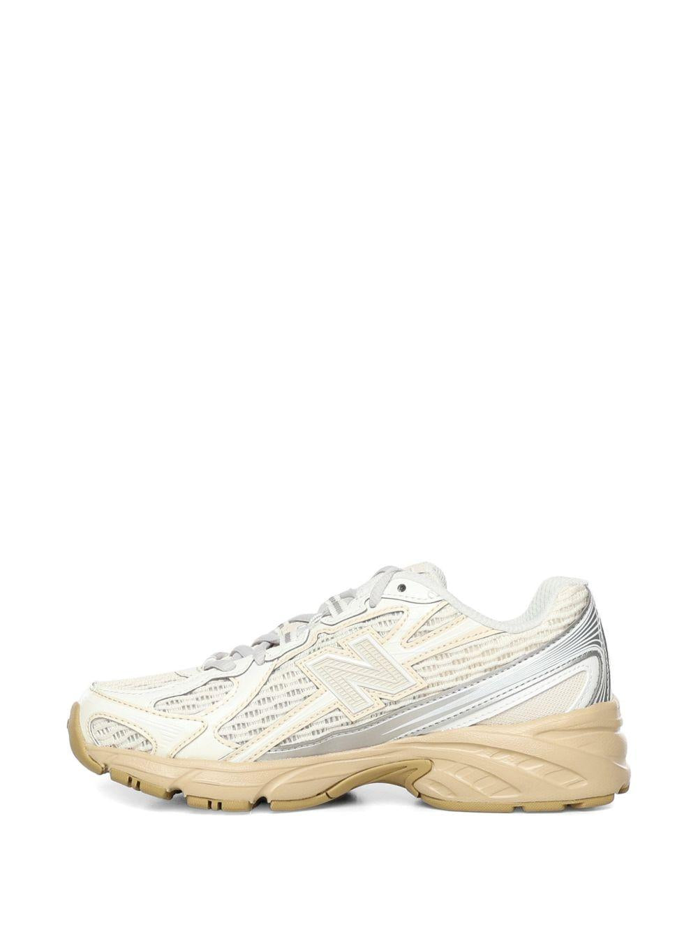 NEW BALANCE Senakers 740 bianche e argento 