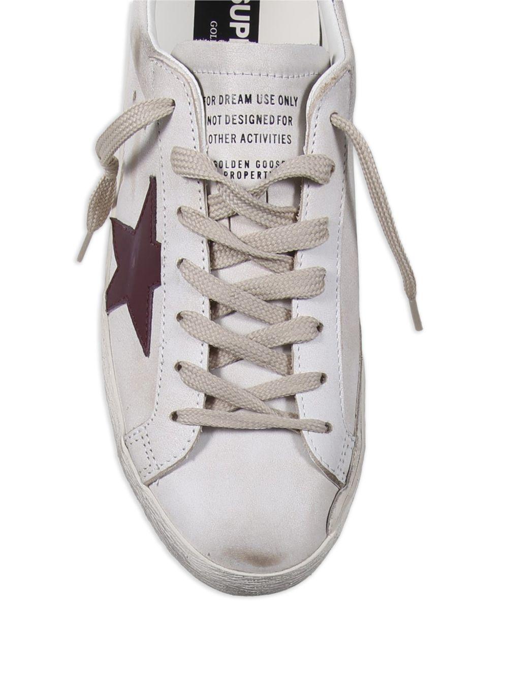 GOLDEN GOOSE Sneakers Super Star in pelle effetto usato 
