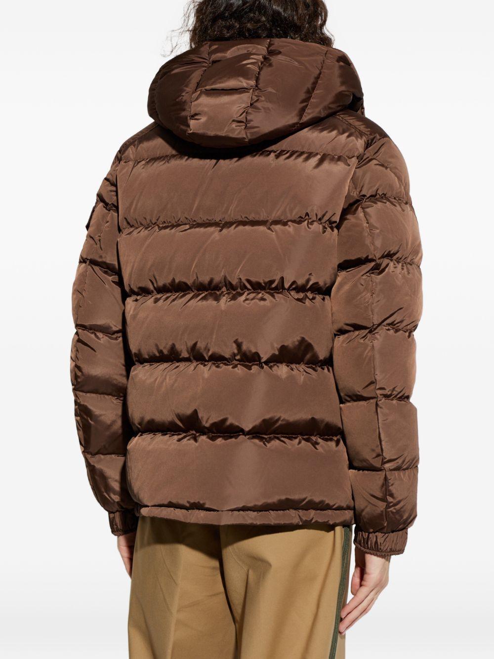 MONCLER Piumino Maya marrone trapuntato con cappuccio e tasche interne 