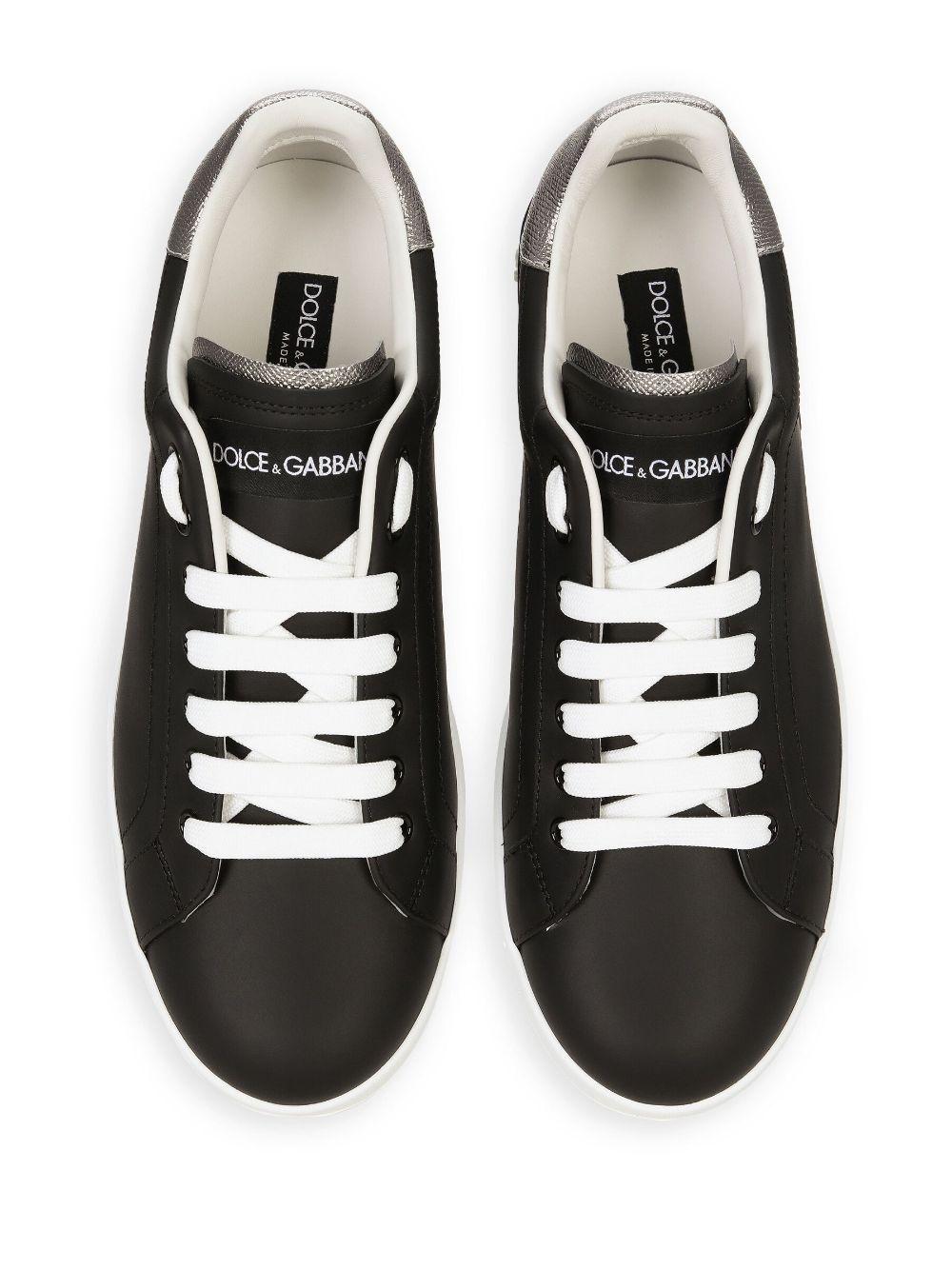 DOLCE e GABBANA Sneakers Portofino in pelle nera con inserti argento 