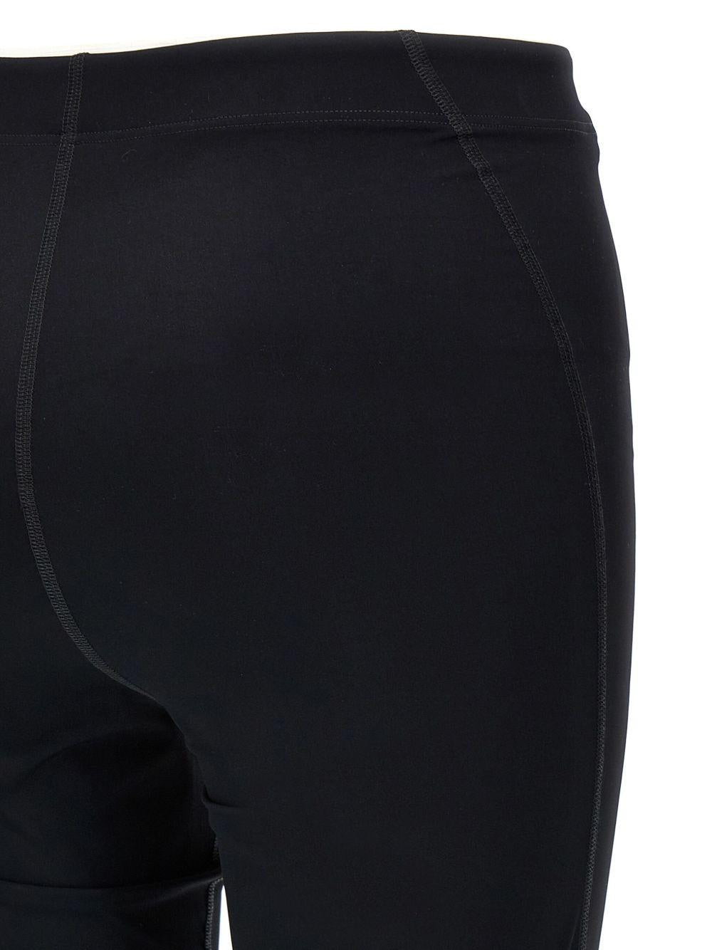JIL SANDER Leggins neri con stampa in vita 