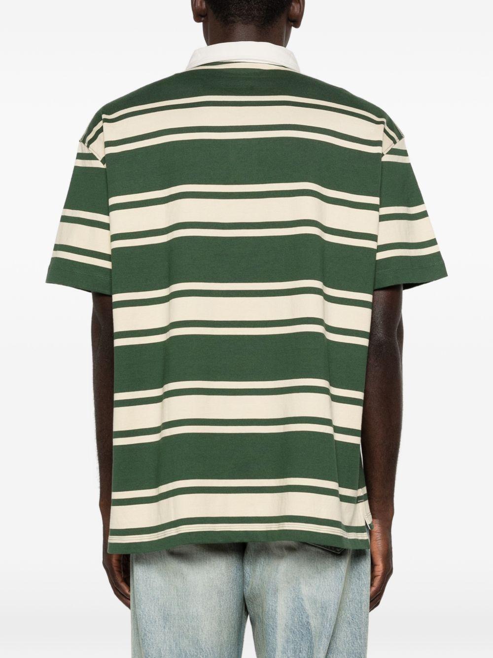 TIMBERLAND Polo verde a righe con logo 