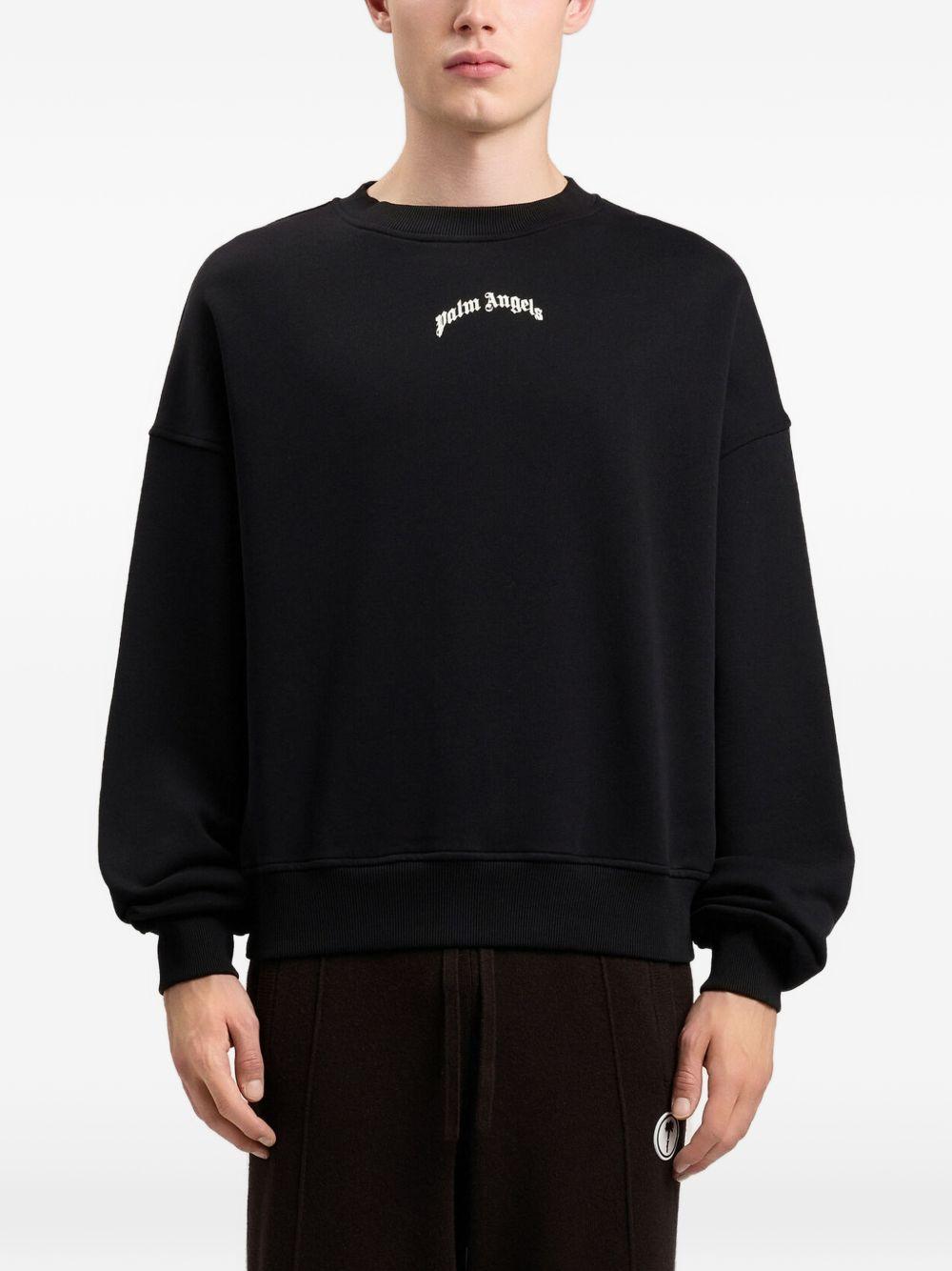 PALM ANGELS Felpa in cotone nero girocollo con logo bianco 