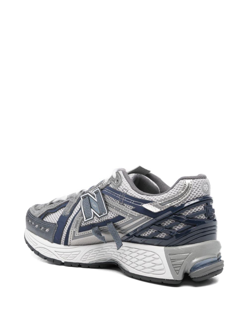 NEW BALANCE Sneakers 1906 grigie e blu 