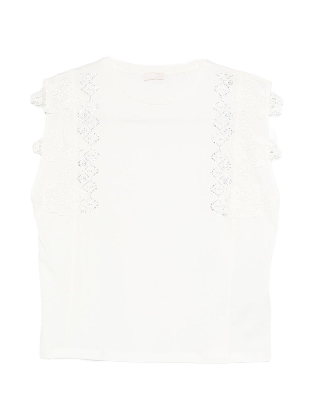 LIUJO T-shirt bianca con ricami e impreziosita da strass argentati 